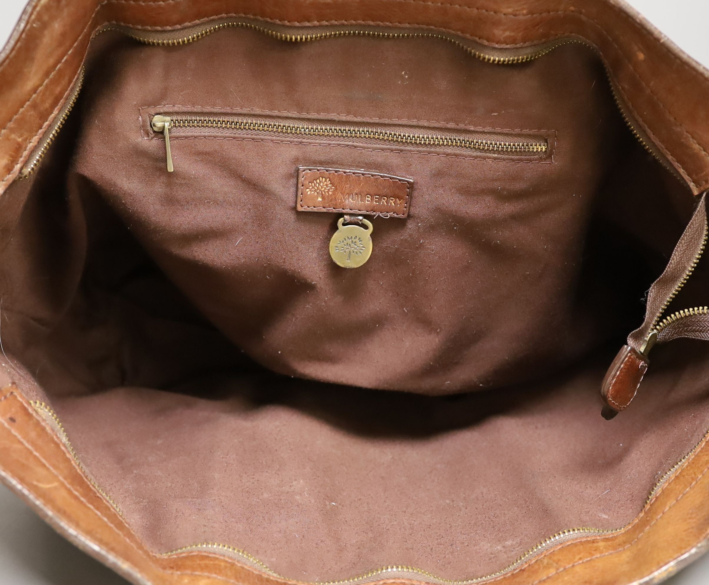 A vintage, Mulberry brown leather ‘shopper’, bag, with shoulder straps, 35 cms high x 52 cms wide.